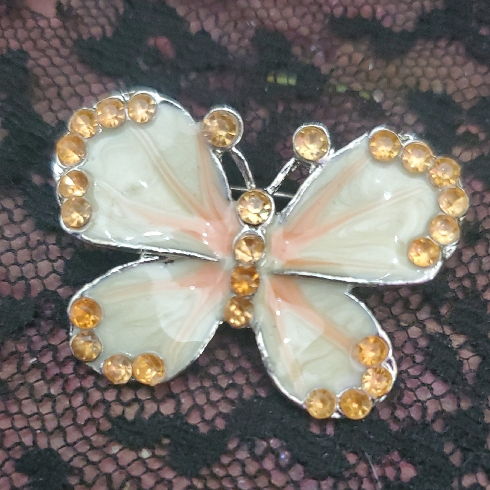Elegant Butterfly Brooch with Orange Accents DZ636